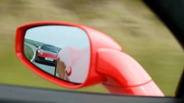 Ferrari 458 Italia beats McLaren MP4-12C