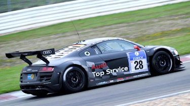 evo races Audi R8 LMS at the Nurburgring