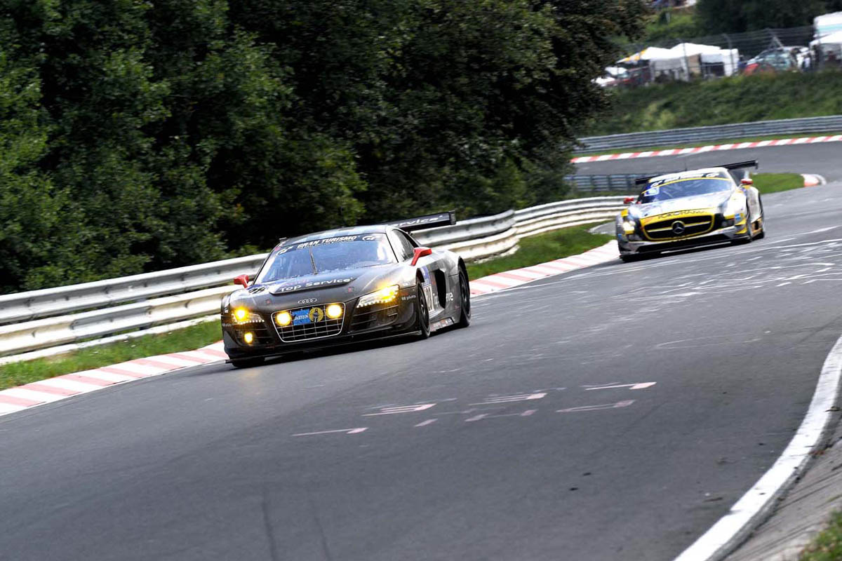 evo races Audi R8 LMS at the Nurburgring