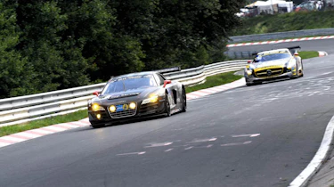 evo races Audi R8 LMS at the Nurburgring