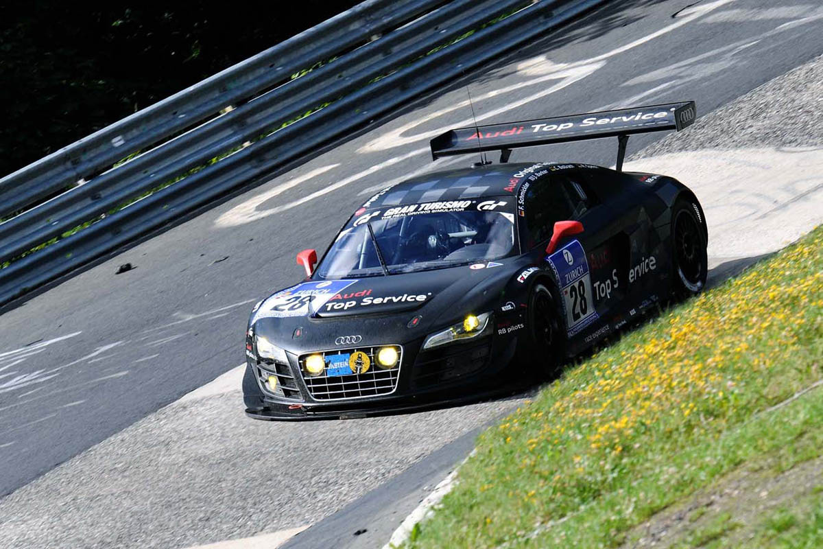 evo races Audi R8 LMS at the Nurburgring