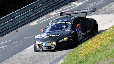 evo races Audi R8 LMS at the Nurburgring