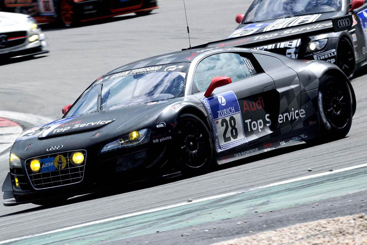 evo races Audi R8 LMS at the Nurburgring