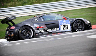 evo races Audi R8 LMS at the Nurburgring