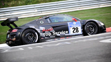 evo races Audi R8 LMS at the Nurburgring