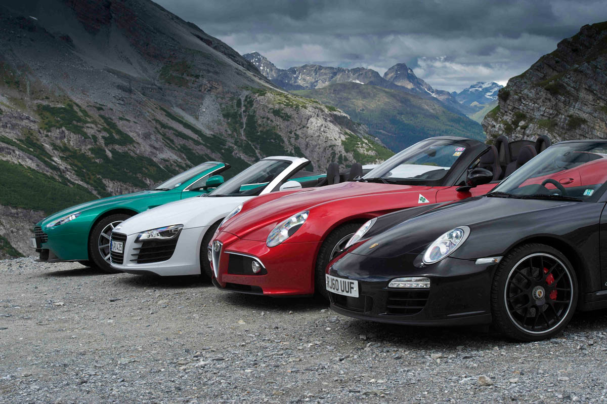 Alfa Romeo 8C Spider v Audi R8 Spyder v Aston Martin Vantage S Roadster v Porsche 911 Carrera GTS cabrio video