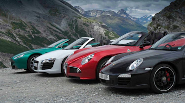 Alfa Romeo 8C Spider v Audi R8 Spyder v Aston Martin Vantage S Roadster v Porsche 911 Carrera GTS cabrio video
