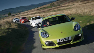 BMW 1-series M Coupe v Porsche Cayman R, Audi TT RS, Nissan 370Z