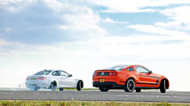 BMW M3 Ford Mustang Boss 302 sideways